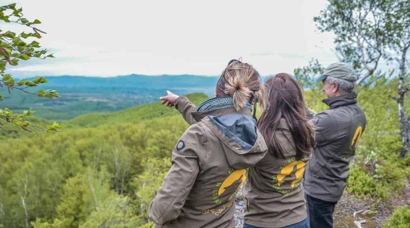 The team assesses wilderness area